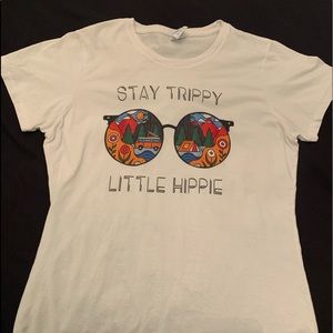 white t-shirt “stay trippy little hippy”